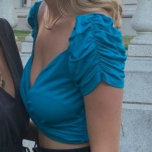 Revolve going out top